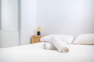 Postel nebo postele na pokoji v ubytování Joli Cocon au Coeur de Cassis