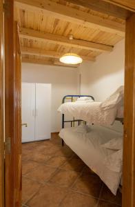 Postel nebo postele na pokoji v ubytování Las Casas de Pecheye