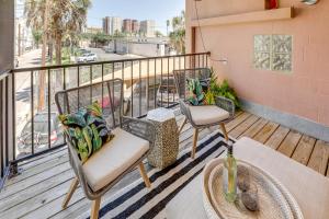 a balcony with two chairs and a table at Renovated San Marcos Vacation Rental with Balcony! in San Marcos