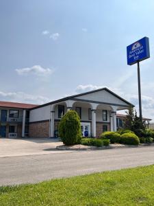 a building with a sign in front of it at Americas Best Value Inn Blue Ridge in Blue Ridge