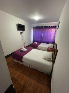 Postel nebo postele na pokoji v ubytování Zigal hotel