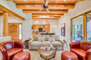 a living room with a couch and chairs at Casita Tres Hermanos in Santa Fe