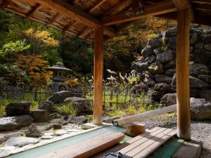 Κήπος έξω από το Ryokan Tamagoyu