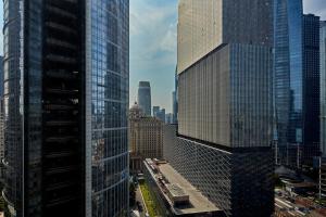 an aerial view of a city with tall buildings at W Guangzhou in Guangzhou +75 photos