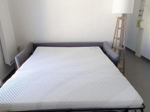 Posteľ alebo postele v izbe v ubytovaní Appartement NEUF 1 chambre, 4 pers, 350m plage Saint Jean de Monts, calme, forêt, commerces à proximité - FR-1-323-268