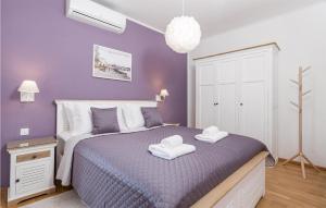 Posteľ alebo postele v izbe v ubytovaní Lovely Apartment In Mali Losinj