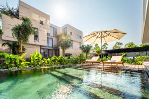 Бассейн в Thuấn Huê Boutique Hotel - Near Vinpearl Nam Hội An или поблизости