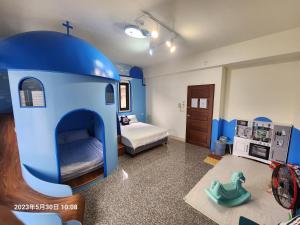 Rúm í herbergi á Cute ohpa BnB