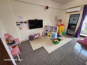 Sjónvarps- og/eða afþreyingartæki á Cute ohpa BnB