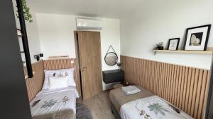 Postel nebo postele na pokoji v ubytování Top Design Apartment