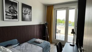 Postel nebo postele na pokoji v ubytování Top Design Apartment