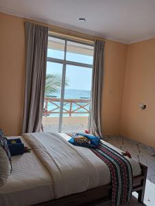 Postel nebo postele na pokoji v ubytování Double A Nungwi Beach Hotel + 37 fotografií