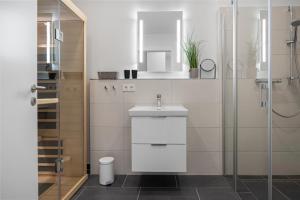 Koupelna v ubytování Weiße Villen Weiße Villen 1-11 + 8 fotografií