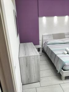Postel nebo postele na pokoji v ubytování CASA DAVID