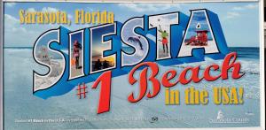 a sign for a beach in the usa at Luxury 3BD house, Siesta Key Beach in Sarasota