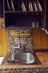 a kitchen counter with a sink in a kitchen at Amumamaria_ vt in Bermeo