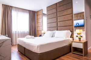 Postel nebo postele na pokoji v ubytování Amfora Hotel & Spa