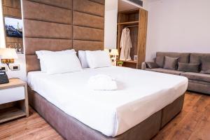 Postel nebo postele na pokoji v ubytování Amfora Hotel & Spa