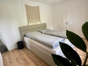 Postel nebo postele na pokoji v ubytování Lendorfer Cottage