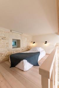 Postel nebo postele na pokoji v ubytování Amvikas suites-Sitia, by Comfortbnb