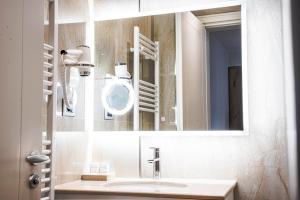 Koupelna v ubytování Amfora Hotel & Spa