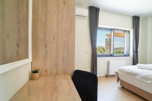 Posteľ alebo postele v izbe v ubytovaní Villa Endless Βlue