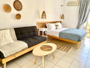 A bed or beds in a room at Seaside Studios Arkasa Karpathos