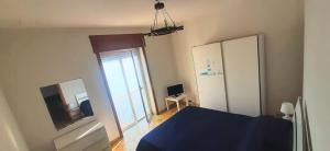 Posteľ alebo postele v izbe v ubytovaní Castello Apartment