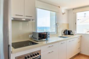 Kuchyňa alebo kuchynka v ubytovaní Penthouse center Altea