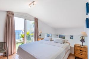 Posteľ alebo postele v izbe v ubytovaní Penthouse center Altea