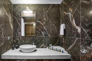 Koupelna v ubytování Agreste Luxury Apartments + 48 fotografií