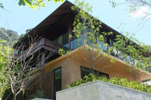 a house with plants on the side of it at Avatar Railay in Railay Beach
