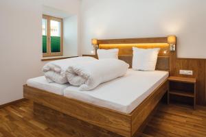 Postel nebo postele na pokoji v ubytování Nowders Zimmer