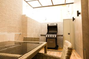 Una cocina o zona de cocina en Apart-hotel Dream