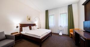 Voodi või voodid majutusasutuse Hotel Vécsecity toas