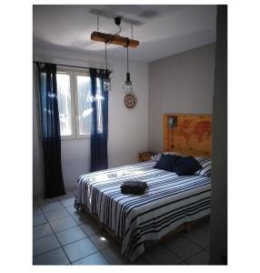En eller flere senge i et værelse på Maison en Provence