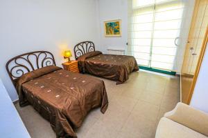 Posteľ alebo postele v izbe v ubytovaní LITORAL COSTA DORADA - CIUTADELLA bjs Only families