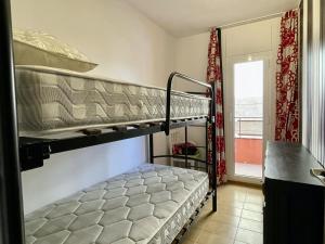 Posteľ alebo postele v izbe v ubytovaní Salles Beach 9 + 16 fotografií
