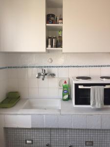 Kuchyň nebo kuchyňský kout v ubytování Yves apartment + 4 fotografie