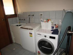 Η κουζίνα ή μικρή κουζίνα στο Captain's Quarters