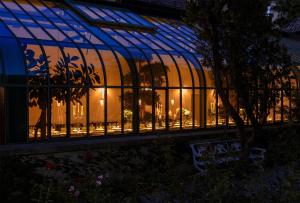 a window of a building with lights in it at Parkhotel Laurin in Bolzano