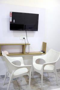 TV a/nebo společenská místnost v ubytování Hotel Amaresh