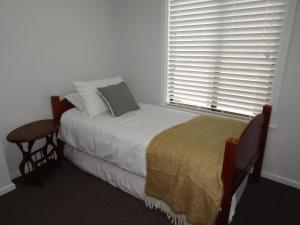 A bed or beds in a room at Hardwicke Haven