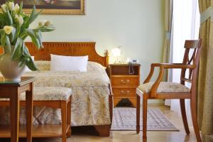 Hotel Kolonada客房内的一张或多张床位