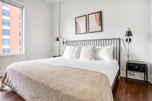 Voodi või voodid majutusasutuse Downtown 1br w gym deck wd nr 6th St bars ATX-21 toas