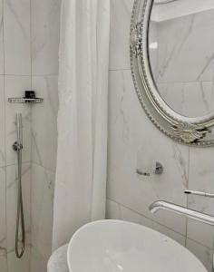 Een badkamer bij Villa Maina