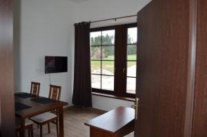 TV a/nebo společenská místnost v ubytování Bison Ranch