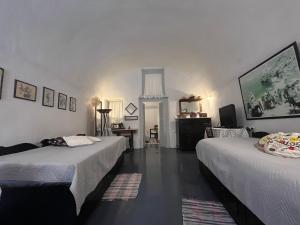 Letto o letti in una camera di Emmantina