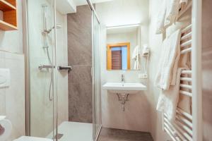 Łazienka w obiekcie Hotel Gesser