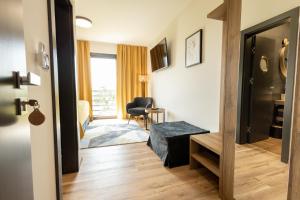 Katil atau katil-katil dalam bilik di Ubytovanie na Tokaji Empora Apartman
